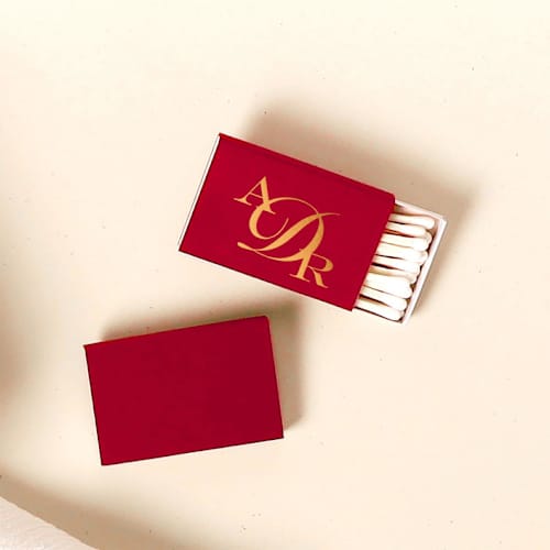 This is a red matchbooks by ForYourParty called bold monogram matchbox, set of 100 in standard