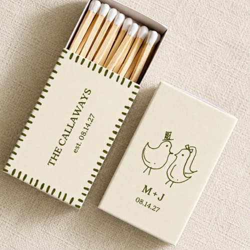 This is a green matchbooks by Paper Haven called wedding chicks customizable matchboxes | set of 50 in standard