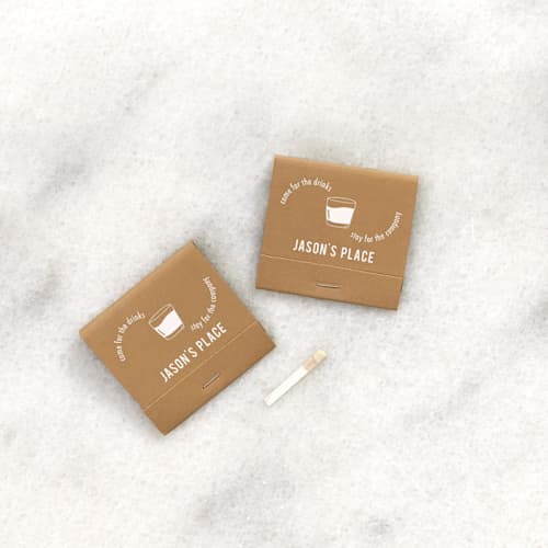 This is a brown matchbooks by ForYourParty called come for the drinks stay for the company matchbooks, set of 50 in standard