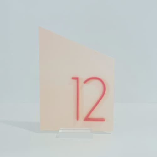 This is a pink table numbers by Alexandra Ettis called geometric acrylic table number in standard