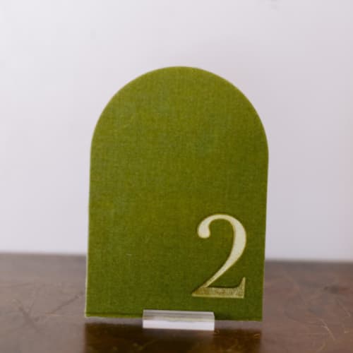 This is a green table numbers by Velvet Raptor called table number - arch - avocado in standard