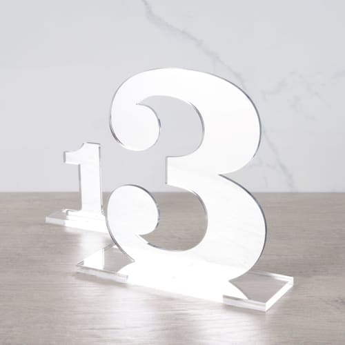 This is a silver table numbers by Em and Me Studio called clarendon table numbers, silver, large in standard