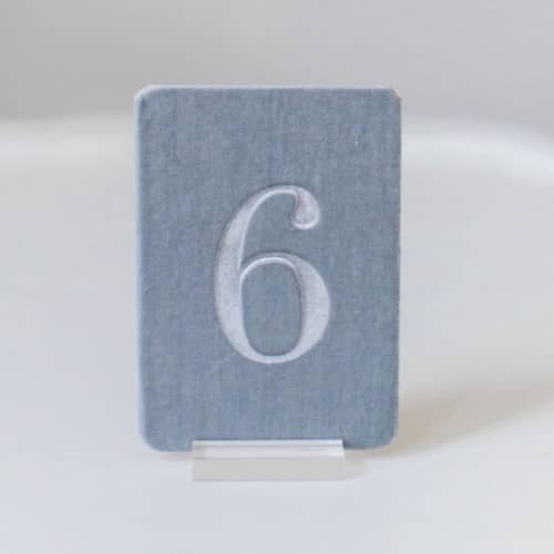 This is a gray table numbers by Velvet Raptor called small rectangle table number - dove in standard