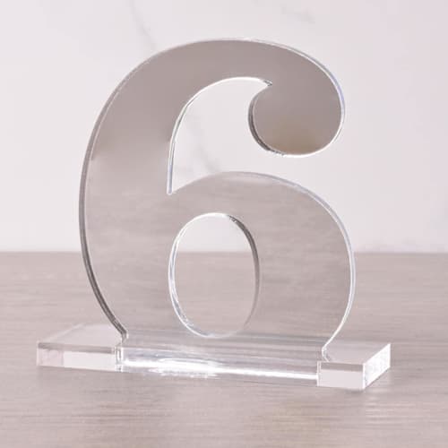 This is a silver table numbers by Em and Me Studio called clarendon table numbers, silver, small in standard