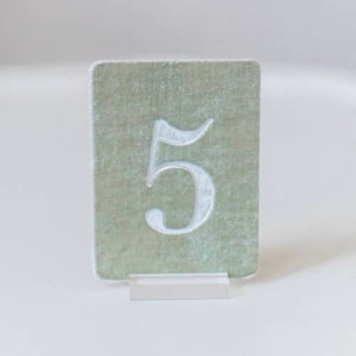 This is a green table numbers by Velvet Raptor called small rectangle table number - seagreen in standard