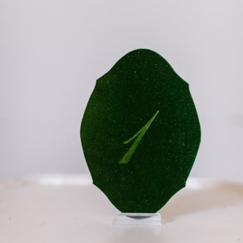 This is a green table numbers by Velvet Raptor called emerald script oval table number in standard