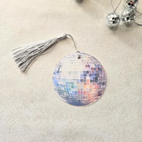 This is a multicolor wedding place cards by Inkspiringletters called watercolor disco ball place card with silver tassel- personalized with calligraphy- set of 10 in standard