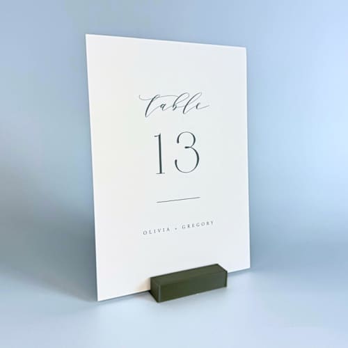 This is a green place card holders by Corduroy Effect called army green rectangle table number holder, set of 5 in standard