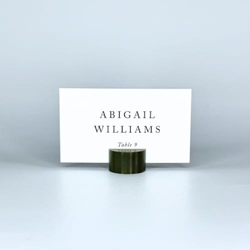 This is a green place card holders by Corduroy Effect called army green circle place card holder, set of 25 in standard