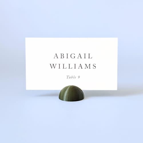 This is a green place card holders by Corduroy Effect called army green dome place card holders, set of 25 in standard