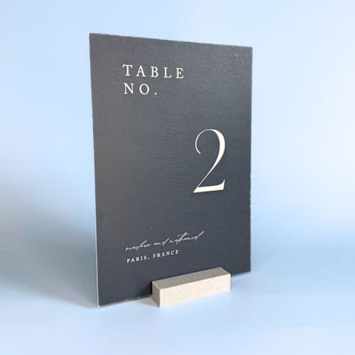 This is a multicolor place card holders by Corduroy Effect called marble pattern rectangle table number holder, set of 5 in standard