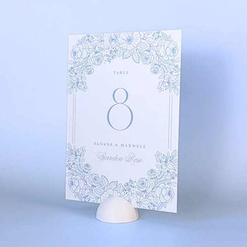 This is a white place card holders by Corduroy Effect called white dome table number holders, set of 5 in standard