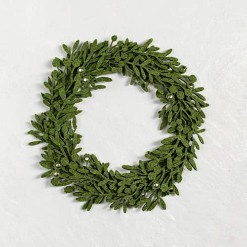 This is a multicolor holiday decorations by Decomundo Home called green felt table wreath in standard