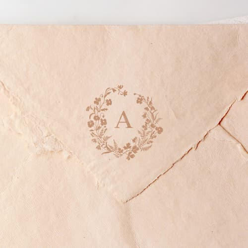 This is a multicolorassorted-colors wedding stationery by Tara Grangroth called 'alpine meadow' custom monogram stamp in standard