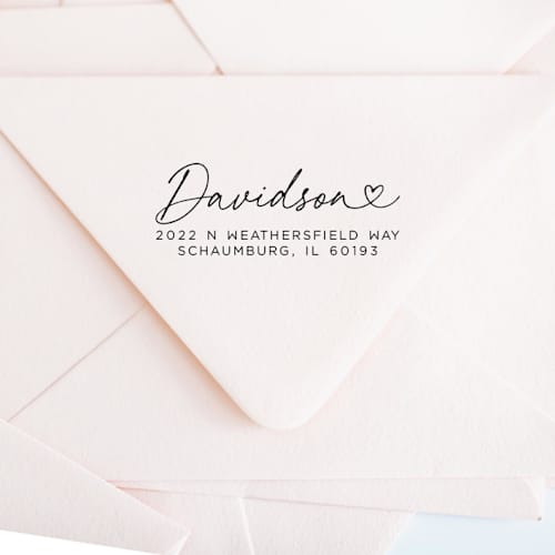 This is a black address labels by Casey Harp called custom heart script address stamp | self-inking | black ink in standard