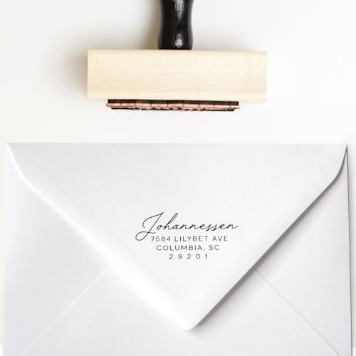 This is a multicolorassorted-colors address labels by Sara Luke called formal script address stamp | wood handle stamp in standard