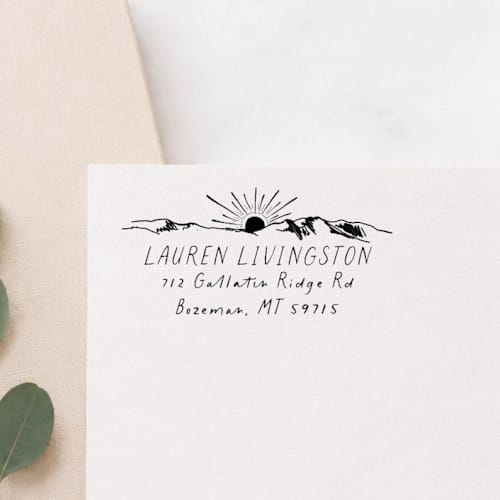 This is a multicolorassorted-colors address labels by Sara Luke called sunrise ridge stamp - mountain address stamp | self-inking stamp in standard