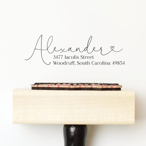 This is a multicolorassorted-colors address labels by Sara Luke called heart return address stamp | wood handle stamp in standard