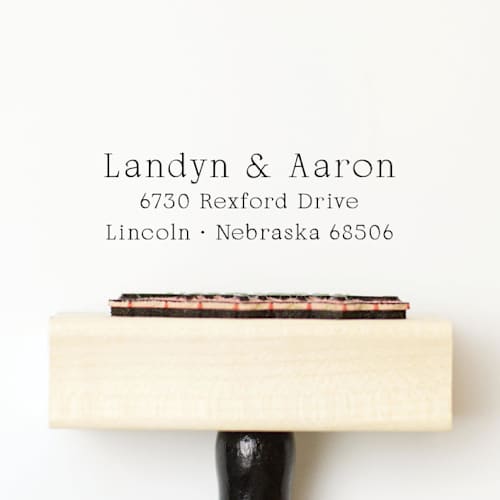 This is a multicolorassorted-colors address labels by Sara Luke called simple 3 line return address stamp - minimalistic | wood handle stamp in standard