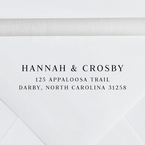This is a black address labels by Sara Luke called simple custom address stamp in al caps| self inking in standard