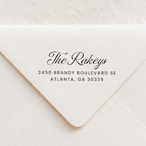 This is a multicolor address labels by Sara Luke called calligraphy return address stamp | self-inking stamp in standard