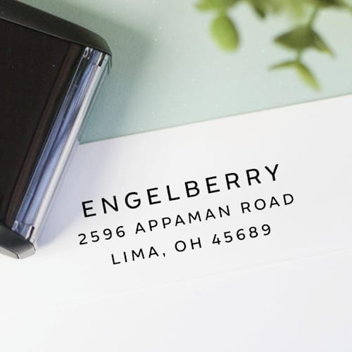 This is a black address labels by Sara Luke called modern minimalistic custom address stamp in all caps - self inking in standard