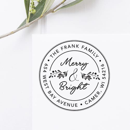 This is a black address labels by Port of Reverie called merry and bright christmas address stamp, round self inking in standard