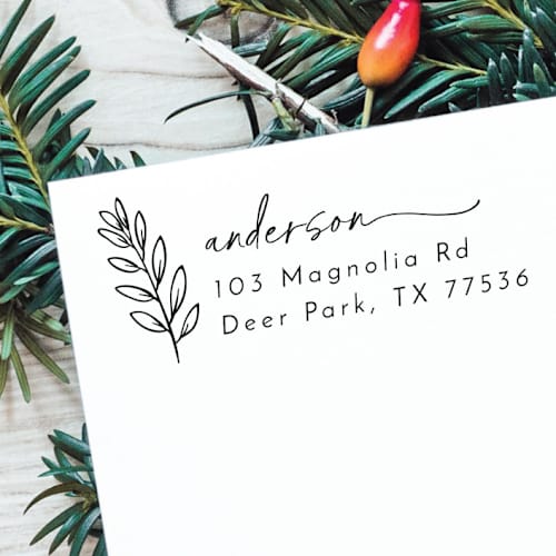 This is a black address labels by Samantha Malvey called christmas card address stamp | self inking return address stamp in standard
