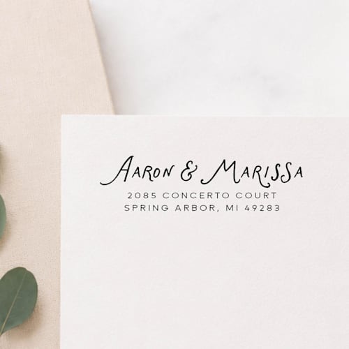 This is a multicolor address labels by Sara Luke called whimsical script return address stamp | self-inking stamp in standard