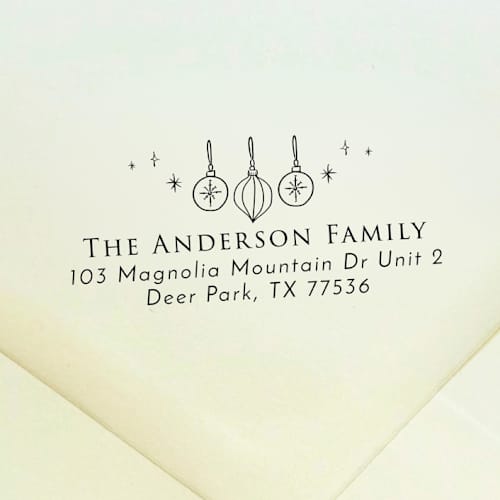 This is a black address labels by Samantha Malvey called christmas ornaments address stamp | self inking return address stamp in standard