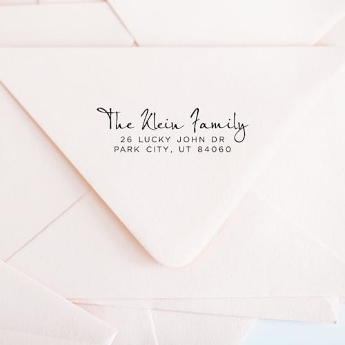 This is a black address labels by Casey Harp called custom script address stamp | self-inking | black ink in standard