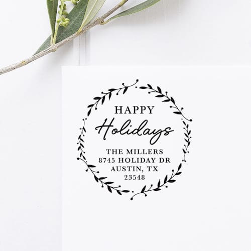 This is a black address labels by Port of Reverie called happy holidays return address stamp, round self inking in standard