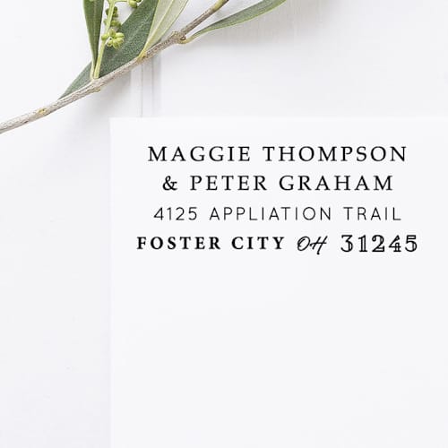 This is a black address labels by Port of Reverie called two names return address stamp, rectangle self inking in standard