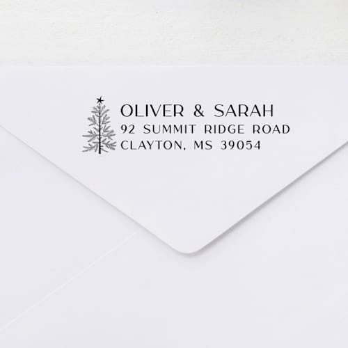 This is a black address labels by Sara Luke called vintage christmas tree address stamp | self-inking in standard