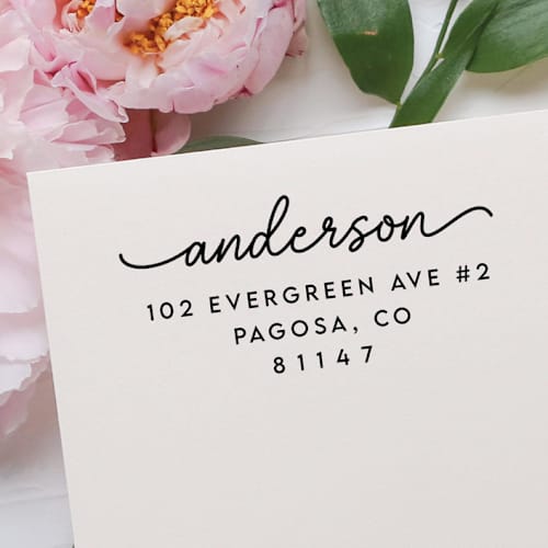 This is a black address labels by Samantha Malvey called custom last name address stamp | self inking return address stamp in standard
