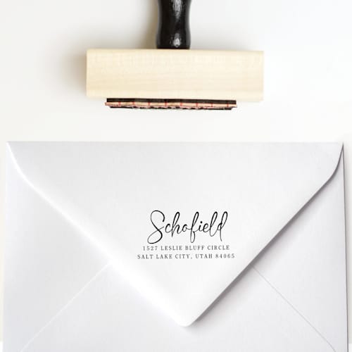 This is a multicolorassorted-colors address labels by Sara Luke called elegant script custom address stamp | wood handle stamp in standard