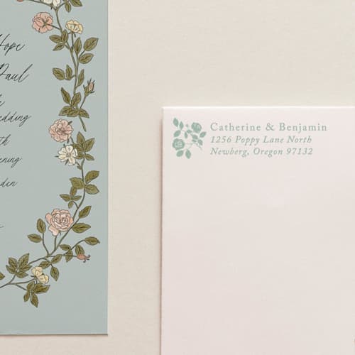 This is a blue address labels by Tara Grangroth called self-ink vintage roses address stamp | sky blue ink color in standard