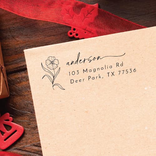 This is a black address labels by Samantha Malvey called poppy holiday address stamp | self inking return address stamp in standard