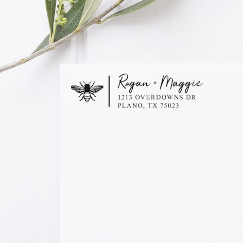 This is a black address labels by Port of Reverie called honey bee return address stamp, rectangle self inking in standard