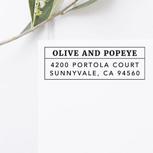 This is a black address labels by Port of Reverie called modern return address stamp, rectangle self inking in standard
