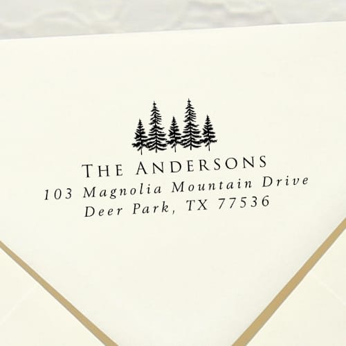 This is a black address labels by Samantha Malvey called evergreen trees address stamp | self inking return address stamp in standard