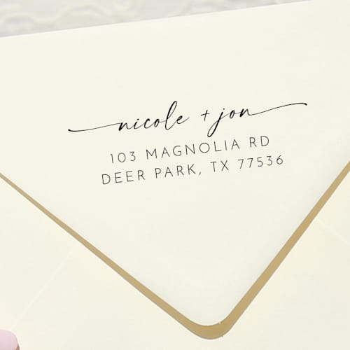This is a black address labels by Samantha Malvey called custom couple address stamp | self inking return address stamp in standard