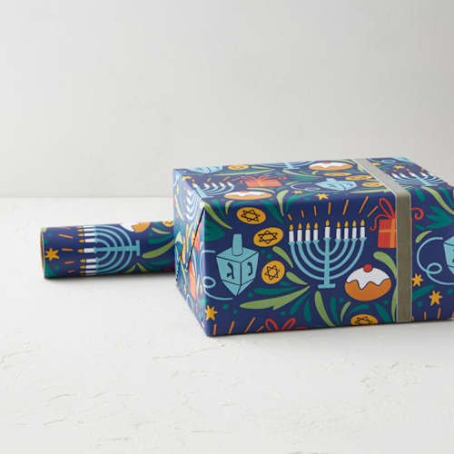 This is a frost wrapping paper by Natalia Gonzalez called hanukkah symbols in standard