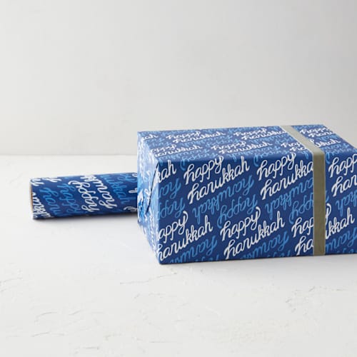 This is a cobalt wrapping paper by Julia Simons called happy hanukkah calligraphy in standard