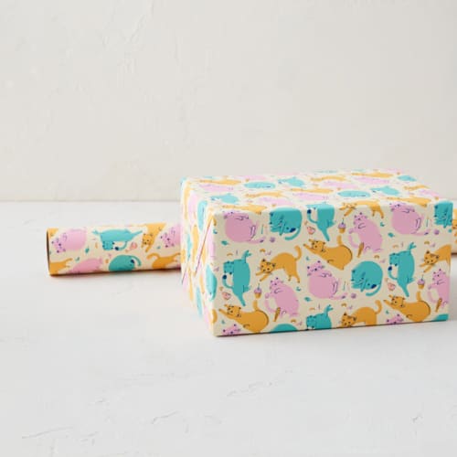 This is a bright wrapping paper by Shannon Chen of Four Wet Feet Studio called party cats in standard