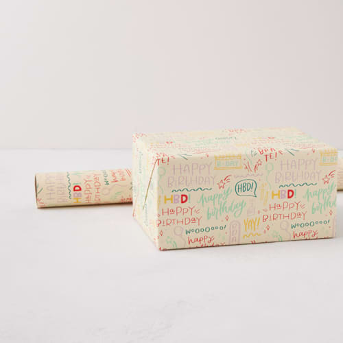This is a celebrate wrapping paper by Olivia Goree called birthday doodles in standard