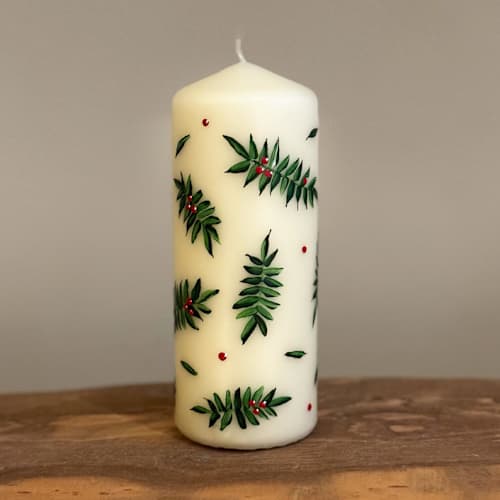 This is a beige holiday decorations by Ashley Myers called ivory pillar with holly berries and greenery, set of 1 in standard