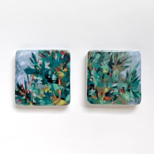 This is a green holiday decorations by Holly Whitcomb called jewel forest ceramic magnets: set of 2 in standard