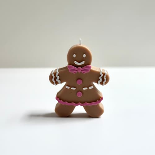 This is a brown holiday decorations by Over By The Moon called gingerbread woman candle in standard