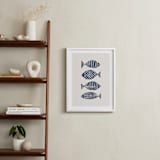 "Linocut Fishes" - Art Print in Navy Blue by Alisa Galitsyna - In a Room